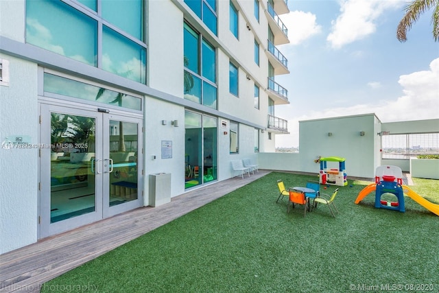92 SW 3rd St Unit 4104, Miami, FL 33130 - view of yard with french doors