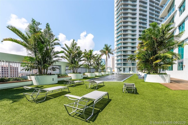 92 SW 3rd St Unit 4104, Miami, FL 33130 - view of community with a yard
