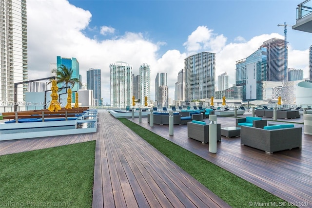 92 SW 3rd St Unit 4104, Miami, FL 33130 - deck featuring outdoor lounge area and a skyline view