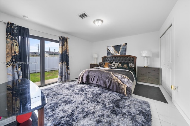 bedroom featuring visible vents and access to outside