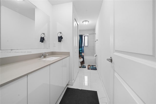 bathroom featuring shower / bathing tub combination, toilet, vanity, and marble finish floor