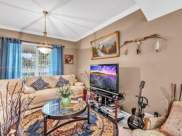 living area with tile patterned flooring, ornamental molding, and a textured ceiling