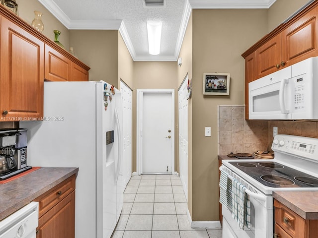 kitchen featuring brown cabinets, light tile patterned floors, white appliances, decorative backsplash, and ornamental molding