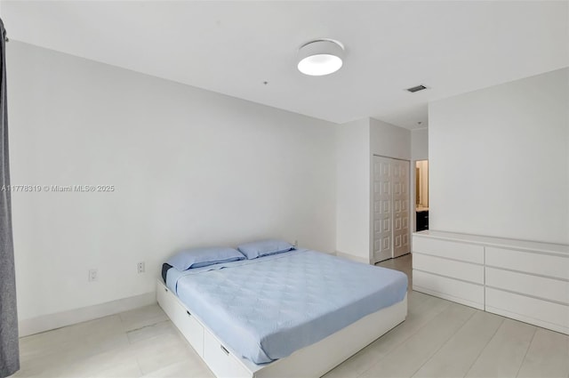 4740 NW 84th Ct Unit 32, Doral, FL 33166 - bedroom featuring baseboards and visible vents