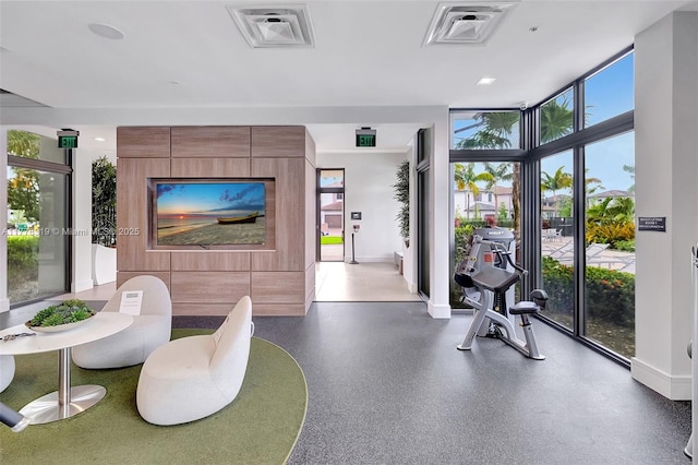4740 NW 84th Ct Unit 32, Doral, FL 33166 - interior space with floor to ceiling windows, baseboards, and visible vents