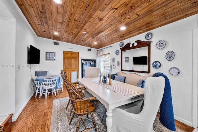 dining space featuring recessed lighting, visible vents, wooden ceiling, and wood finished floors