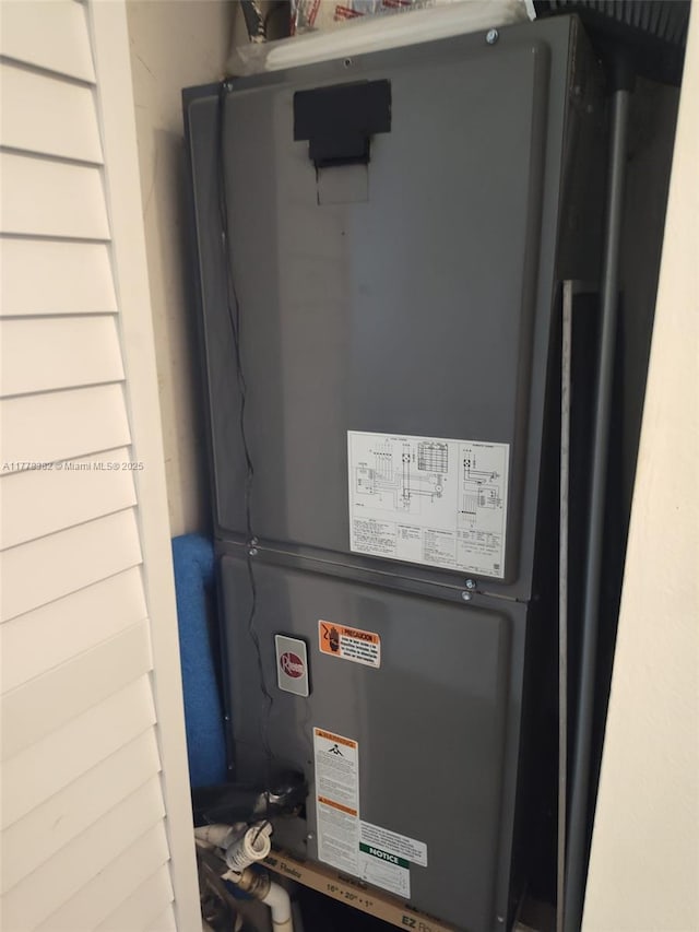 5054 Lakefront Blvd Unit A, Delray Beach, FL 33484 - utility room featuring heating unit