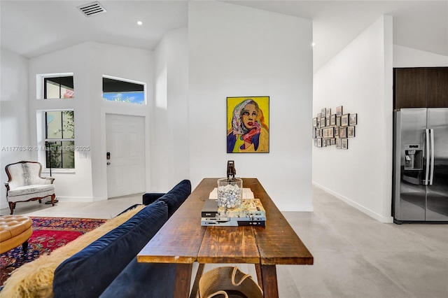living area featuring visible vents, baseboards, high vaulted ceiling, recessed lighting, and finished concrete floors