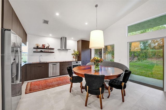 dining space featuring recessed lighting and visible vents