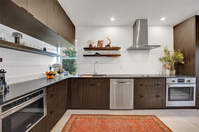 kitchen with appliances with stainless steel finishes, modern cabinets, open shelves, and wall chimney exhaust hood