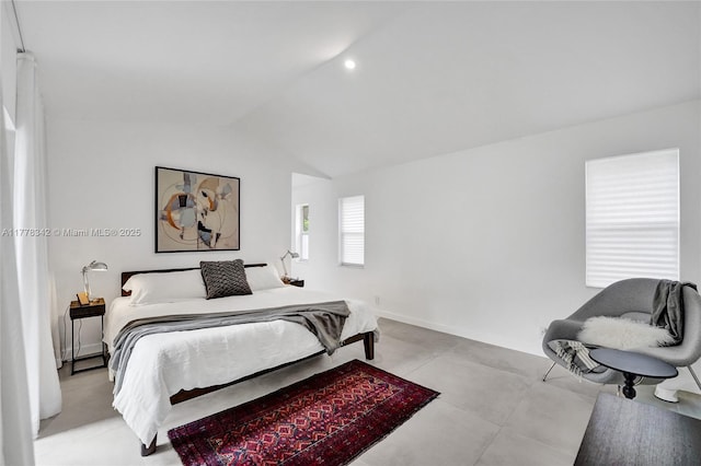 bedroom with baseboards, vaulted ceiling, and recessed lighting