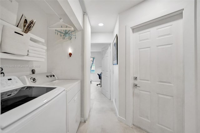 648 Sand Creek Cir, Weston, FL 33327 - washroom featuring washing machine and clothes dryer and recessed lighting