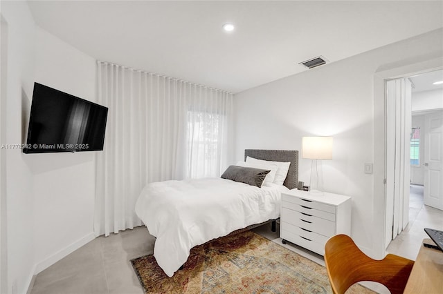 bedroom with recessed lighting, baseboards, and visible vents
