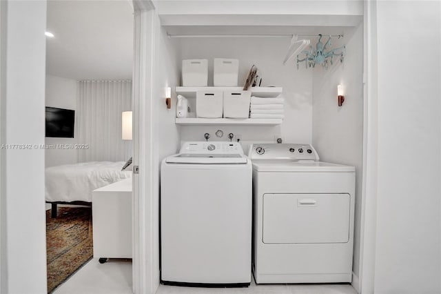 laundry room featuring laundry area and independent washer and dryer