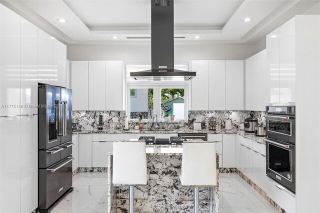5815 SW 107th Pl, Miami, FL 33173 - kitchen featuring high quality fridge, a raised ceiling, modern cabinets, backsplash, and recessed lighting