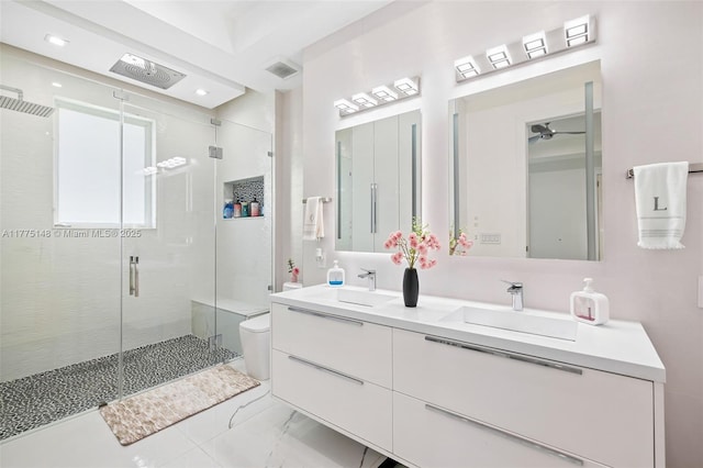 5815 SW 107th Pl, Miami, FL 33173 - bathroom with marble finish floors, toilet, a shower stall, ceiling fan, and double vanity