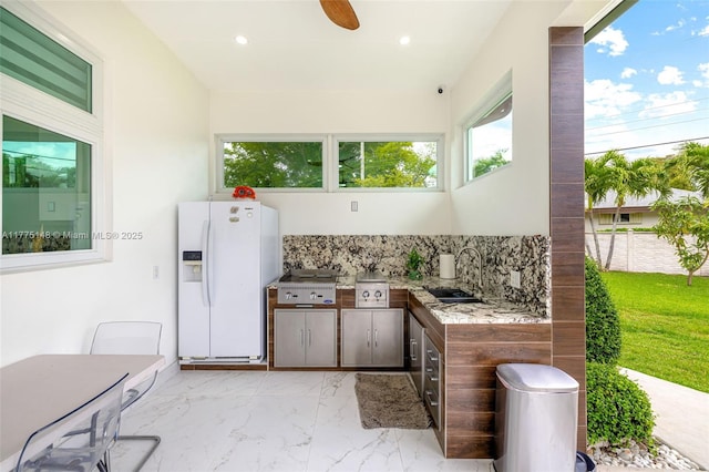 5815 SW 107th Pl, Miami, FL 33173 - view of patio / terrace with exterior kitchen, a sink, and a ceiling fan