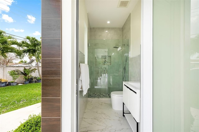 5815 SW 107th Pl, Miami, FL 33173 - bathroom with a shower stall, marble tiled floors, vanity, toilet, and recessed lighting