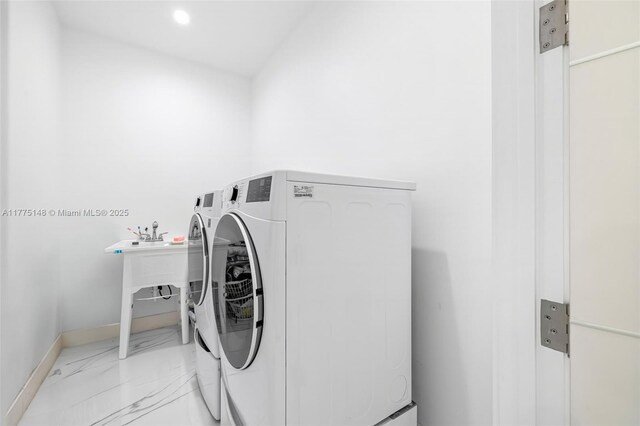 5815 SW 107th Pl, Miami, FL 33173 - washroom with washer and dryer, marble finish flooring, baseboards, and recessed lighting