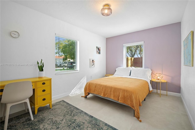 bedroom with baseboards