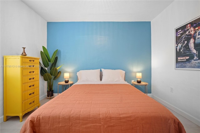 bedroom featuring baseboards