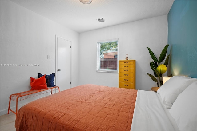 bedroom with visible vents