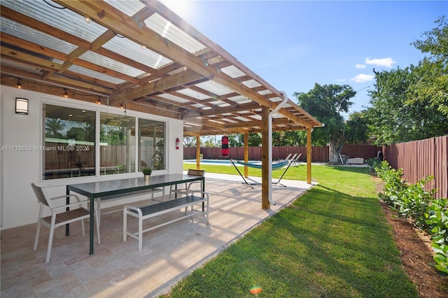 view of yard with a patio, a pergola, a fenced backyard, and a fenced in pool