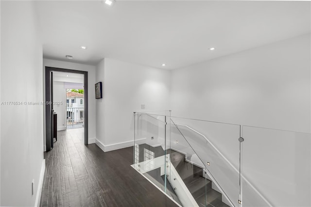 3106 NE 210th Ter, Aventura, FL 33180 - hallway featuring baseboards, wood finished floors, and recessed lighting