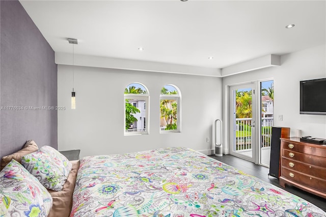 3106 NE 210th Ter, Aventura, FL 33180 - bedroom featuring access to exterior, multiple windows, dark wood-style floors, and recessed lighting