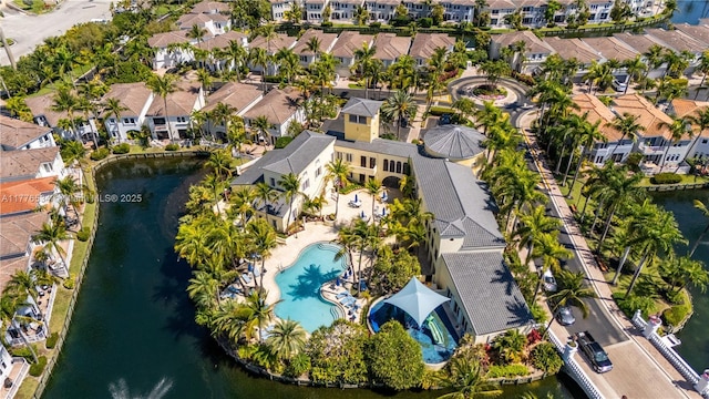 3106 NE 210th Ter, Aventura, FL 33180 - aerial view of property and surrounding area featuring nearby suburban area, a pool, and a nearby body of water