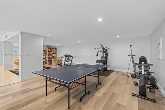 recreation room featuring visible vents, baseboards, light wood finished floors, and recessed lighting