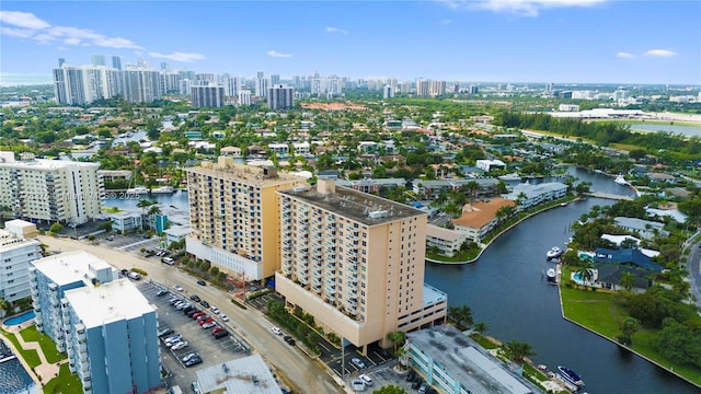 aerial view featuring a city view and a water view