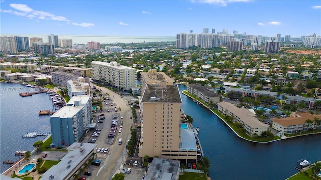 aerial view featuring a water view and a city view
