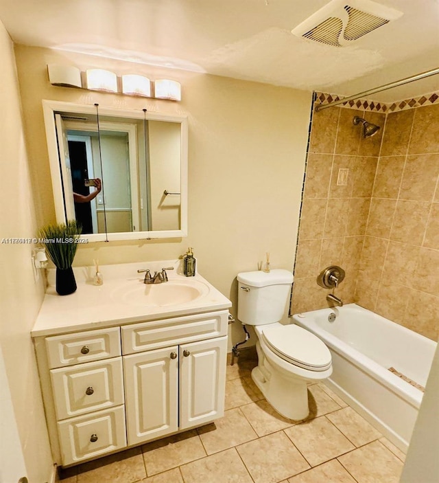 bathroom featuring tub / shower combination, vanity, tile patterned flooring, visible vents, and toilet