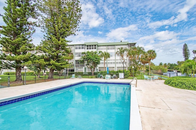 community pool with fence