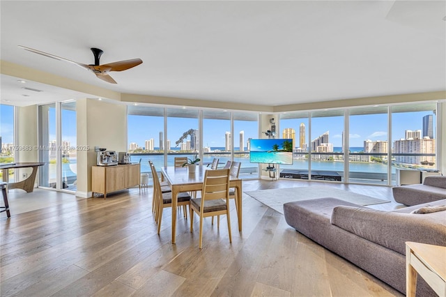 2600 E Island Blvd Unit 1704, Aventura, FL 33160 - dining room with a ceiling fan, wood finished floors, and a wall of windows