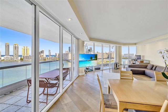 2600 E Island Blvd Unit 1704, Aventura, FL 33160 - dining room featuring a view of skyline, a wall of windows, light wood-style flooring, and recessed lighting