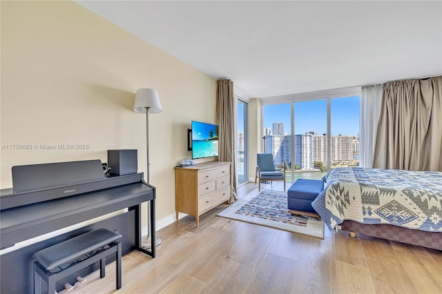 2600 E Island Blvd Unit 1704, Aventura, FL 33160 - bedroom with light wood-style flooring and baseboards