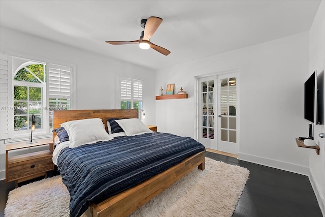 bedroom with french doors, baseboards, a ceiling fan, and wood finished floors