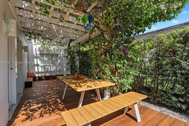 wooden terrace with a pergola