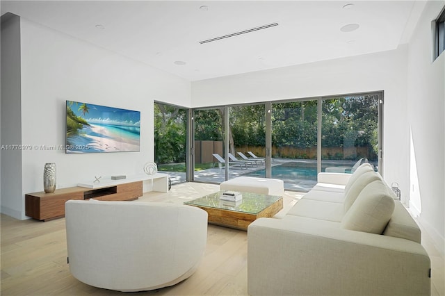 living area with light wood-type flooring
