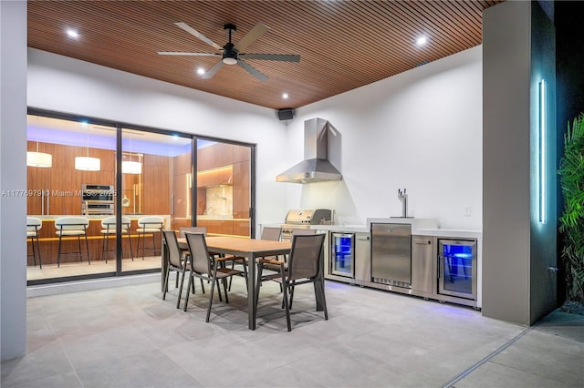 dining area featuring recessed lighting, wood ceiling, beverage cooler, and ceiling fan