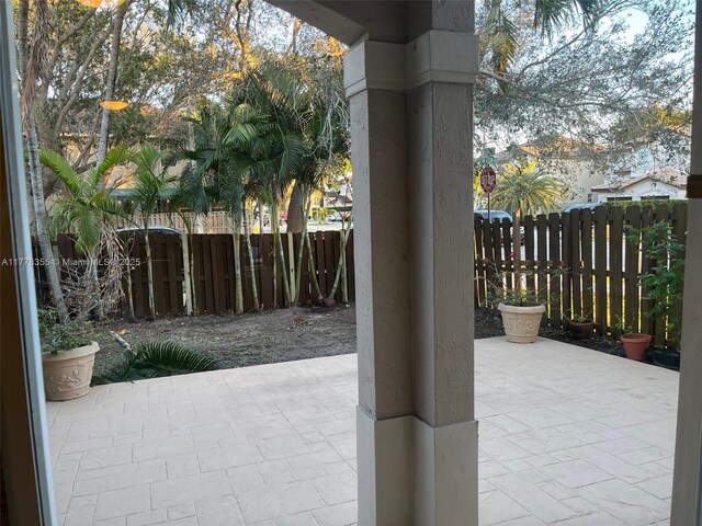977 SW 153rd Path, Miami, FL 33194 - fenced backyard featuring a patio area