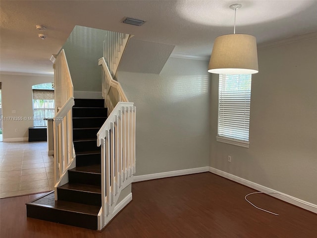 977 SW 153rd Path, Miami, FL 33194 - stairs featuring ornamental molding, wood finished floors, and baseboards