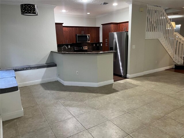 977 SW 153rd Path, Miami, FL 33194 - kitchen featuring appliances with stainless steel finishes, light tile patterned flooring, tasteful backsplash, a sink, and ornamental molding