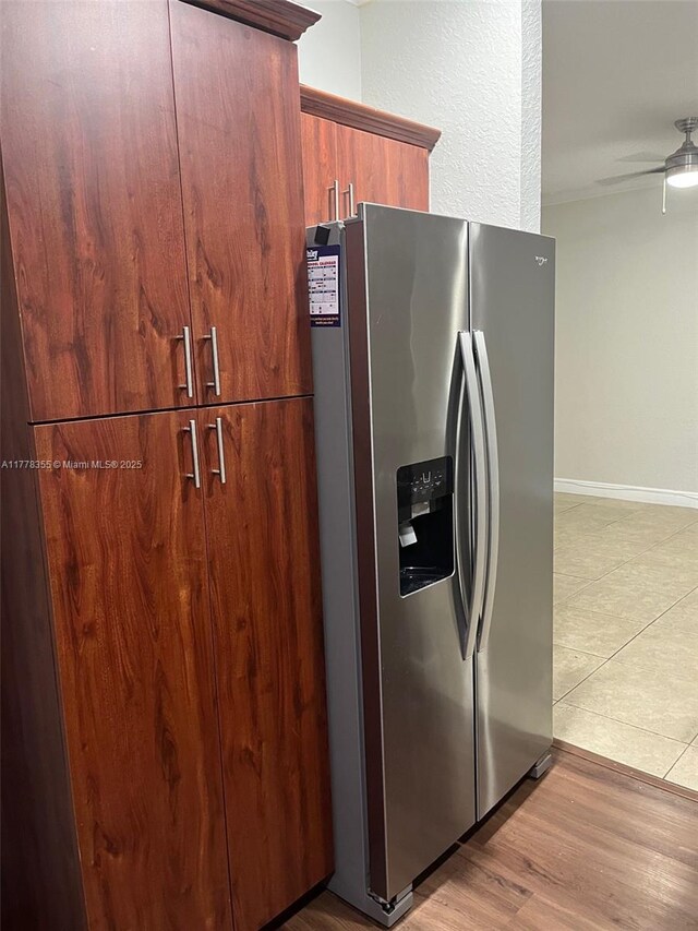 977 SW 153rd Path, Miami, FL 33194 - kitchen featuring stainless steel refrigerator with ice dispenser, ceiling fan, and light wood-style flooring