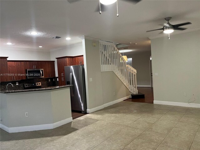 977 SW 153rd Path, Miami, FL 33194 - kitchen featuring stainless steel appliances, ceiling fan, light tile patterned floors, crown molding, and decorative backsplash