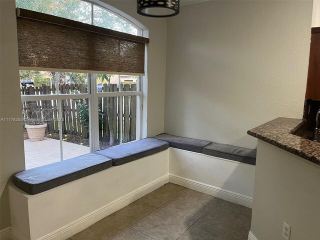 977 SW 153rd Path, Miami, FL 33194 - unfurnished dining area with baseboards and tile patterned flooring