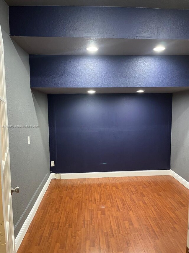 977 SW 153rd Path, Miami, FL 33194 - empty room featuring wood finished floors and baseboards
