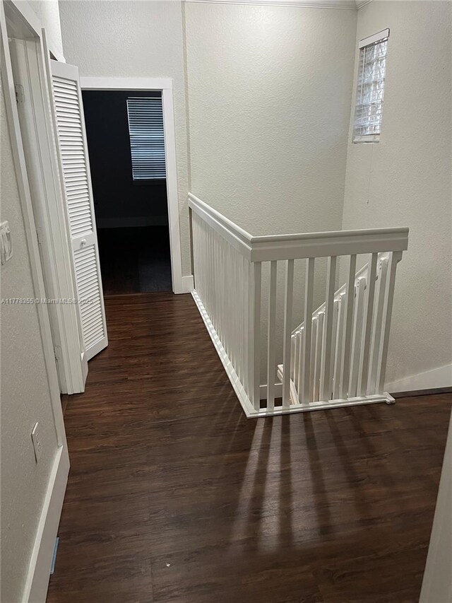 977 SW 153rd Path, Miami, FL 33194 - hall featuring wood finished floors, a textured wall, and baseboards